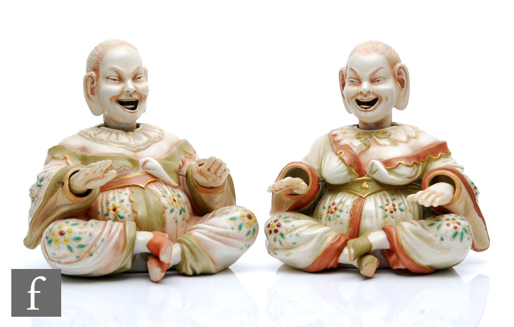 A pair of late 19th to early 20th Century Ernst Bohne and Sohne Chinoiserie bisque nodding figures