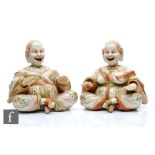A pair of late 19th to early 20th Century Ernst Bohne and Sohne Chinoiserie bisque nodding figures