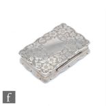 A hallmarked silver rectangular snuff box with foliate engraved decoration to whole within shaped