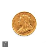 A Victoria veil head full sovereign dated 1893.