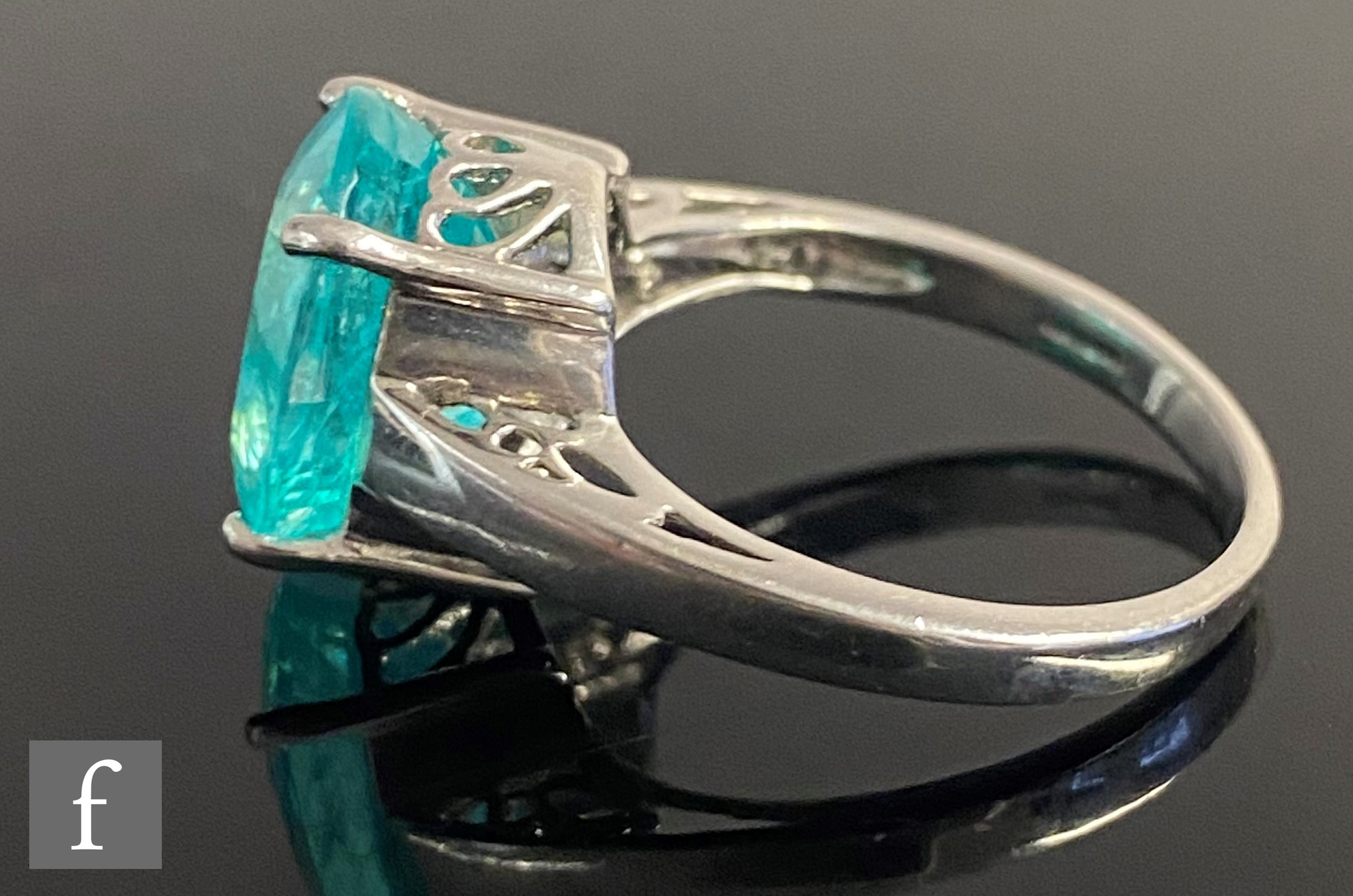 An 18ct white gold single stone, claw set paraiba tourmaline, weight approximately 6.78ct, to - Image 2 of 8