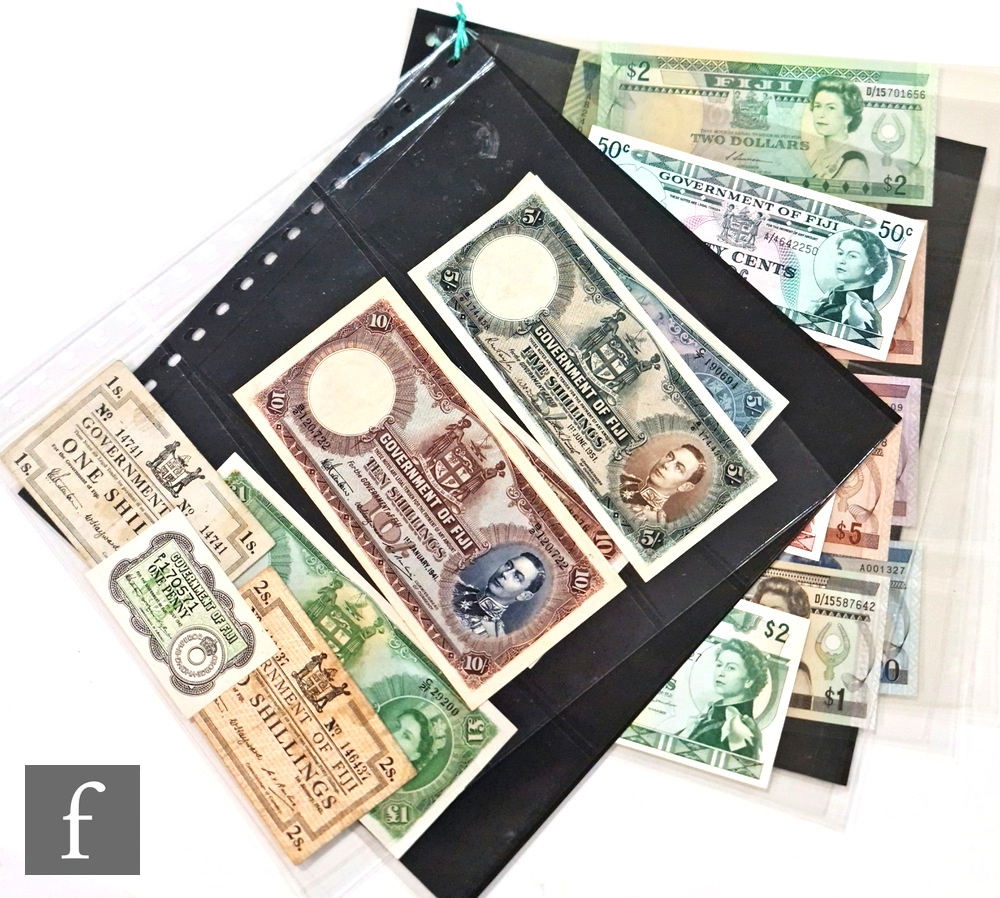 Various Government of Fiji banknotes to include 1942 one and two shilling notes, a 1941 ten