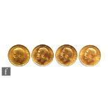 Four George V full sovereigns dated 1915, 1918, 1919 and 1923.