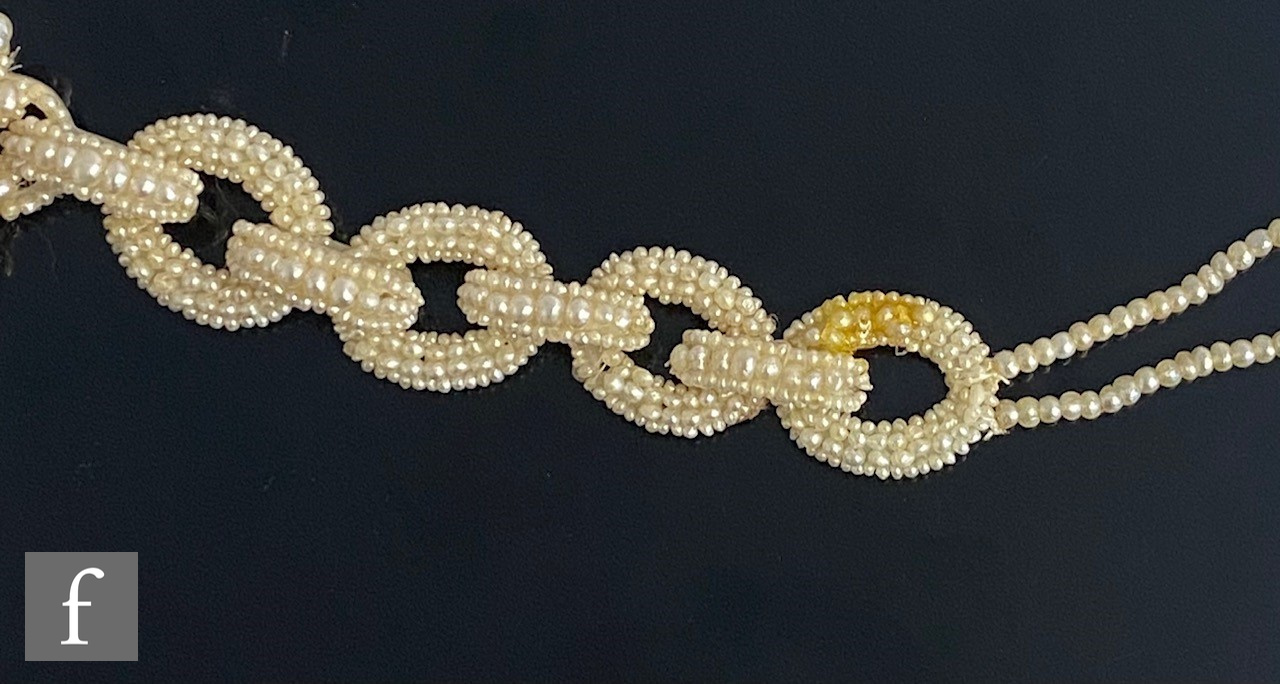 A cased 19th Century seed and mother of pearl choker comprising a central pierced cluster flanked by - Image 2 of 9