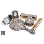 A small parcel lot of hallmarked silver to include two modern easel photograph frames and a