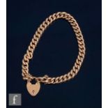An early 20th Century 9ct rose gold hollow, curb link bracelet, weight 12.5g, terminating in padlock