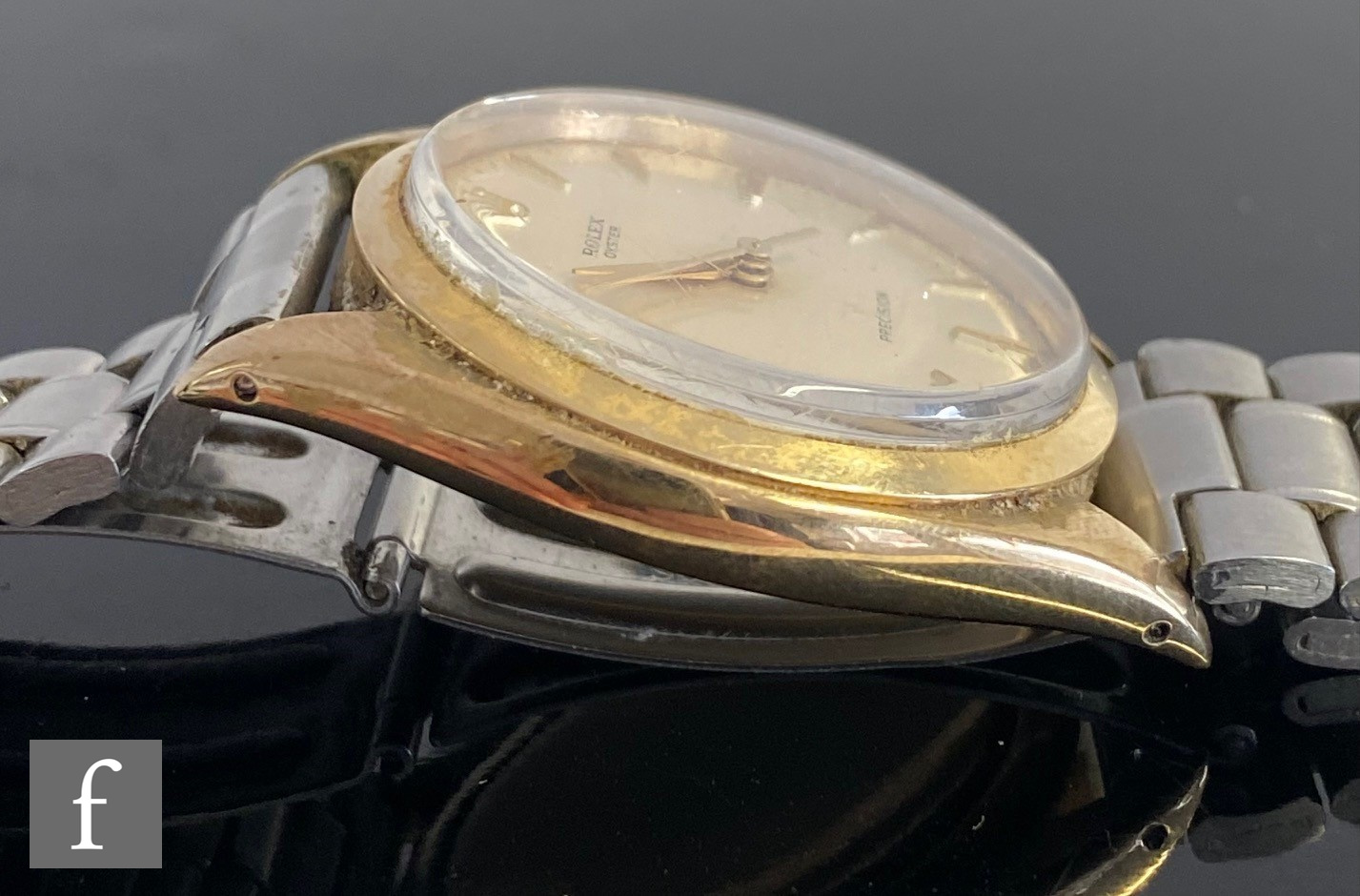 A 9ct hallmarked Rolex Oyster Precision automatic wrist watch with gilt batons to a cream dial, case - Image 7 of 8