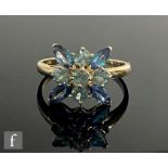 A 9ct alexandrite cluster ring comprising nine marquise and round cut claw set stones, weight 3g,