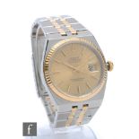 A gentleman's stainless steel and gold Rolex Oyster quartz Datejust wrist watch, gilt batons and