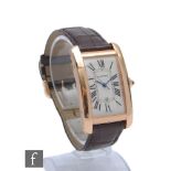 A gentleman's 18ct rose gold Cartier American Tank wrist watch with Roman numerals and date to a