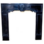 A rare early Irish Kilkenny black marble Chimneypiece, George I, the shaped and moulded frieze