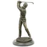 An attractive bronzed metal model of a Golfer, performing a swing, on circular granite base, approx.