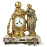 A 19th Century French ormolu Mantle Clock, depicting a young girl with book in hand resting
