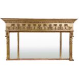 A late Regency period gilt Overmantel Mirror, with three bevelled plates, the dentil moulded cornice