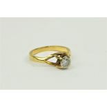 An attractive gold Ladies Solitaire Ring, by John Roche, of Art Deco style, high set stone with open