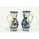 A pair of late 17th / early 18th Century London Delft blue and white water/wine Cruets, each approx.