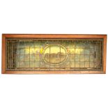 An attractive 19th Century Irish stained glass Landscape Panel, with central oval depicting The Bank