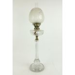 An unusual cutglass Oil Lamp, with baluster shaped facet cut stem and reeded glass reservoir