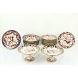 A 14 piece Crown Derby Dessert Service, in the Imari style, comprising a pair of stemmed Comports