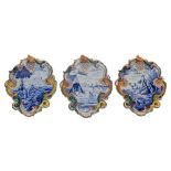 A good set of 3 cartouche shaped polychrome Makkum Fresian earthenware 19th Century Tichelear,