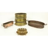 A heavy oval pierced brass Wastepaper Bin or Turf Holder, with lion mask and ring handles, 12"h x