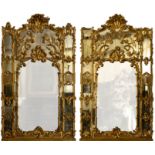 A magnificent and large pair of Irish carved giltwood compartmental Console Mirrors, attributed to
