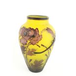 An attractive cameo glass Vase, by Gallé with flowers and locust design, 10 1/2" (27cms). (1)
