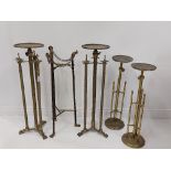 A pair of brass tripod Jardiniere Stands, with circular top and paw feet, 32" (81cms), adjustable,