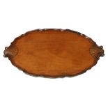 An important Irish Georgian period mahogany oval shaped Serving Tray, with pie-crust edge and