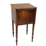 A 19th Century mahogany Bedside Pot Cupboard, with single door on ring turned legs, 74cms x 39cms (