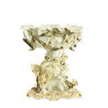 A very good large Moore Brothers porcelain Table Center, with flower encrusted bowl and stems over a