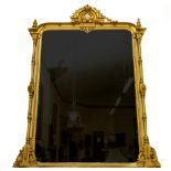 A large Victorian giltwood Overmantel Mirror, with leaf crest above  a semi-arched plate, the