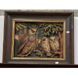 An attractive Resin Model of a Mother Owl and two Chicks, perched on branch, decorated in relief