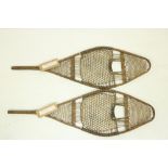 A pair of 19th Century racket shaped Snow Shoes, made of hardwood and seal sinew. (2) Provenance:
