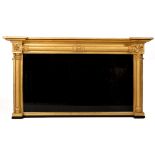A William IV period giltwood Overmantel Mirror, of inverted breakfront form in the manner of Del