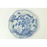 An attractive large 19th Century Japanese blue and white Dish, decorated with birds and flowers,