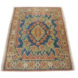 An attractive 19th Century Turkish Karabagh woollen Carpet, the central blue ground with panelled