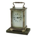A small 19th Century English brass cased Carriage Clock, on a green marble base (loose). (2)