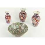 A pair of Japanese Imari Vases, each decorated in typical palette, 10 1/2" (27cms), and a smaller