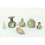 A collection of 6 antique Roman coloured glass Vessels, of various size, shape and form, as