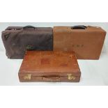A Peel & Co. Ltd. London small plain leather Suitcase; together with a navy blue leather small