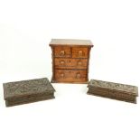 A 19th Century elm miniature Chest, with two long and two short drawers, with turned pilasters, 10