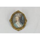 19th Century French School Miniature: A small oval miniature on paper, 'An elegant young lady with