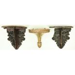 A rare pair of carved and pierced Chinese cherrywood Wall Brackets, (one as is) each carved with