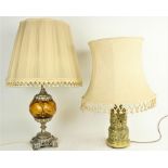 An embossed brass Table Lamp, the two stage body with classical figures in relief supporting an