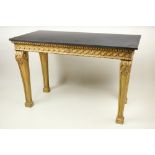 A fine pair of William Kent style carved giltwood Console Tables, each with a Vitruvian scroll
