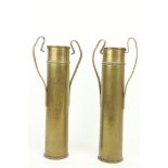 A pair of converted Artillery Shells as two handled Vases, 41cms (16")high. (2)