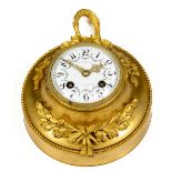 A good French ormolu Cartel Clock, the mounts in the form of flower and leaf swags tied with