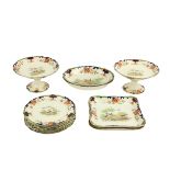 A 14 piece Royal Doulton Dessert Service, comprising a pair of oval boat shaped Serving Bowls, a
