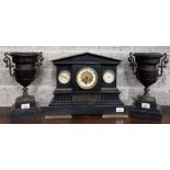 An unusual 3 piece polished black slate Mantel Clock Garniture, the architectural style Clock with